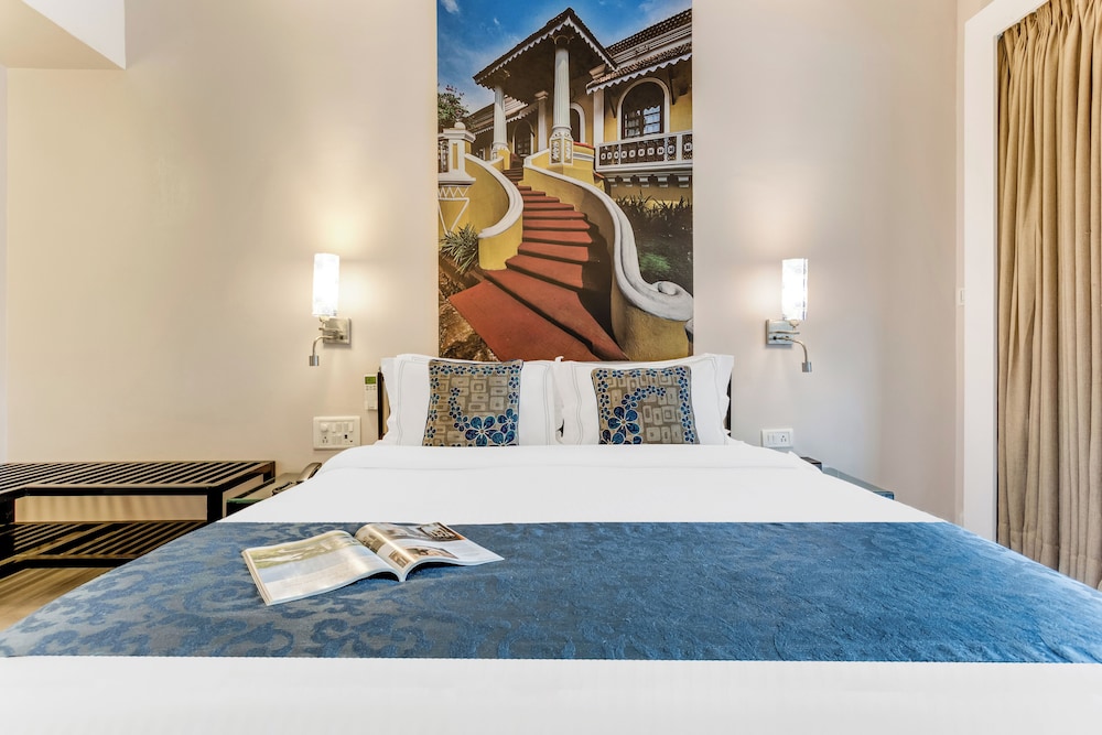 Whispering Palms Beach Resort — Hotel rooms in Candolim, Goa