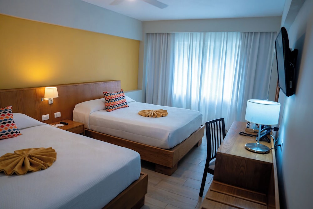 Coral Costa Caribe Beach Resort - All Inclusive — Hotel rooms in Juan Dolio, San Pedro de Macorís