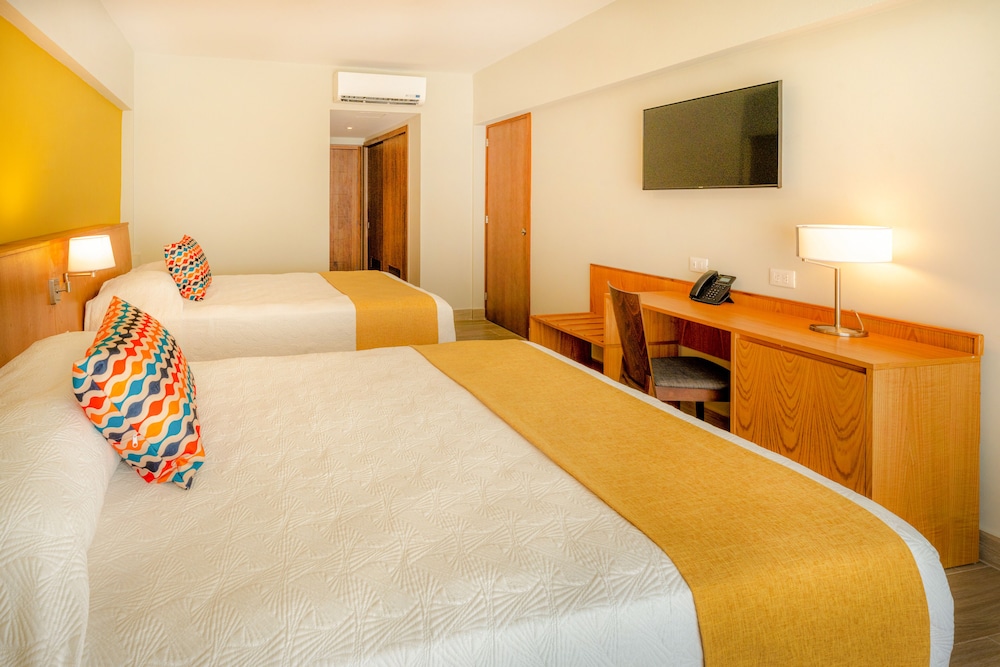 Coral Costa Caribe Beach Resort - All Inclusive — Hotel rooms in Juan Dolio, San Pedro de Macorís