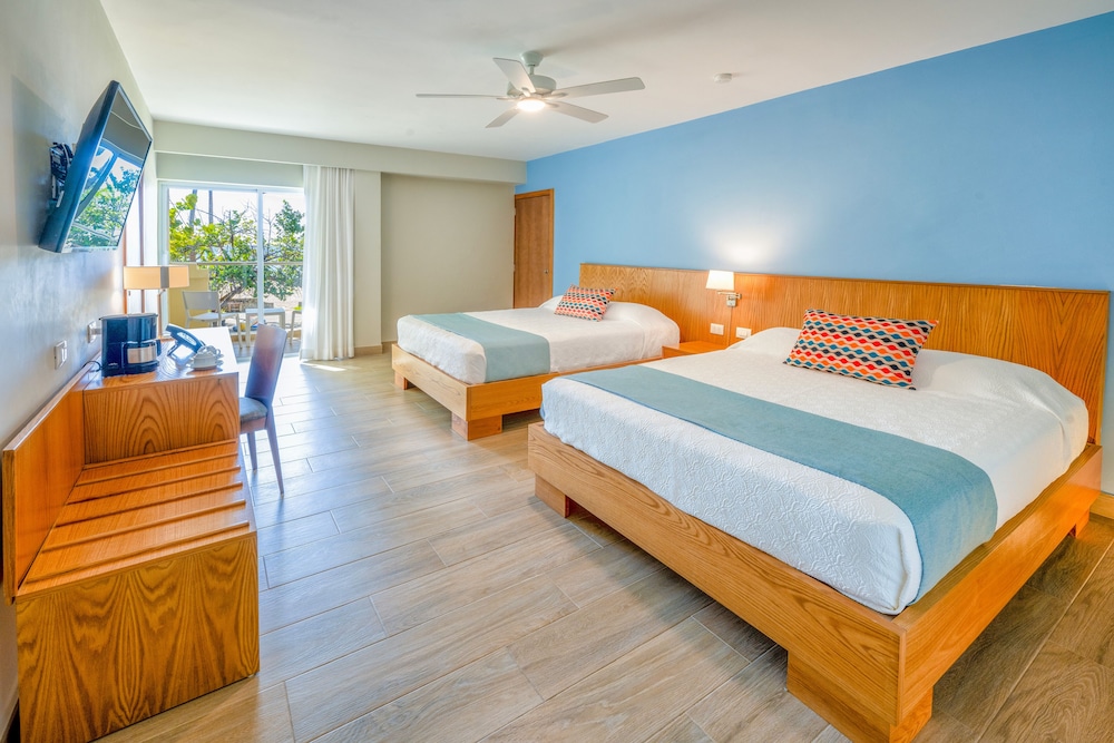 Coral Costa Caribe Beach Resort - All Inclusive — Hotel rooms in Juan Dolio, San Pedro de Macorís