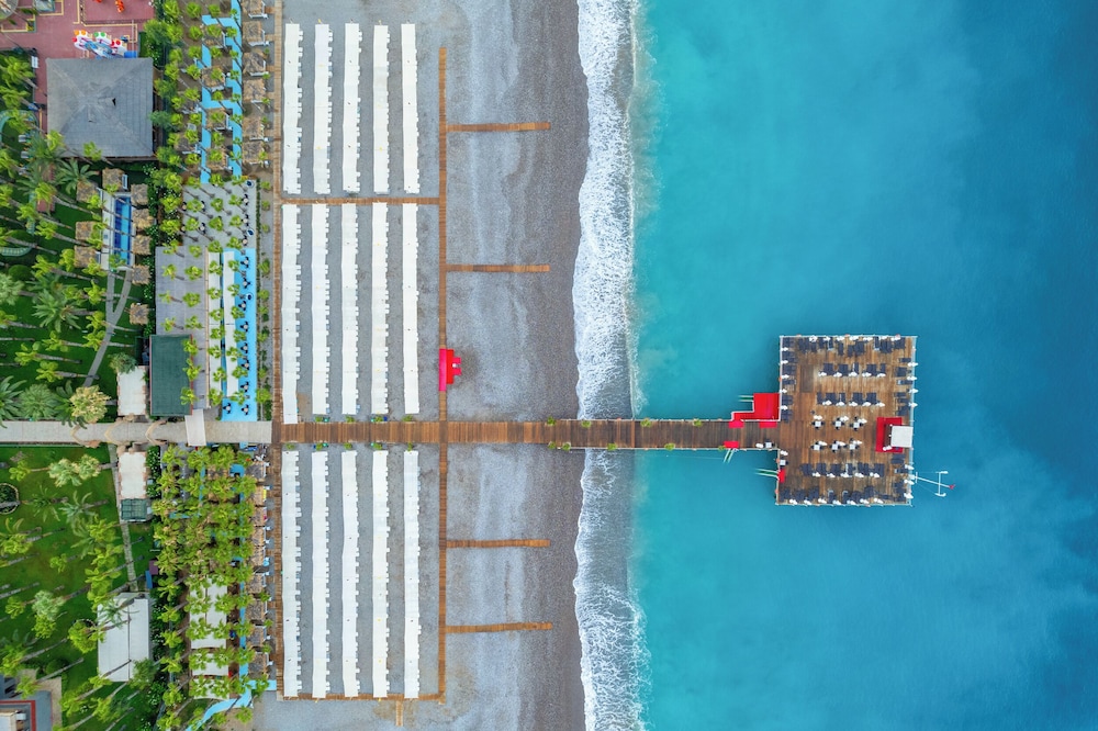 Delphin Deluxe Resort Hotel - All Inclusive — Beach in Okurcalar