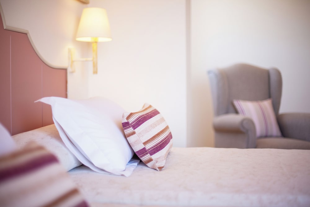 Grupotel Macarella Suites & Spa — Hotel rooms in Cala'n Bosch, Balearic Islands