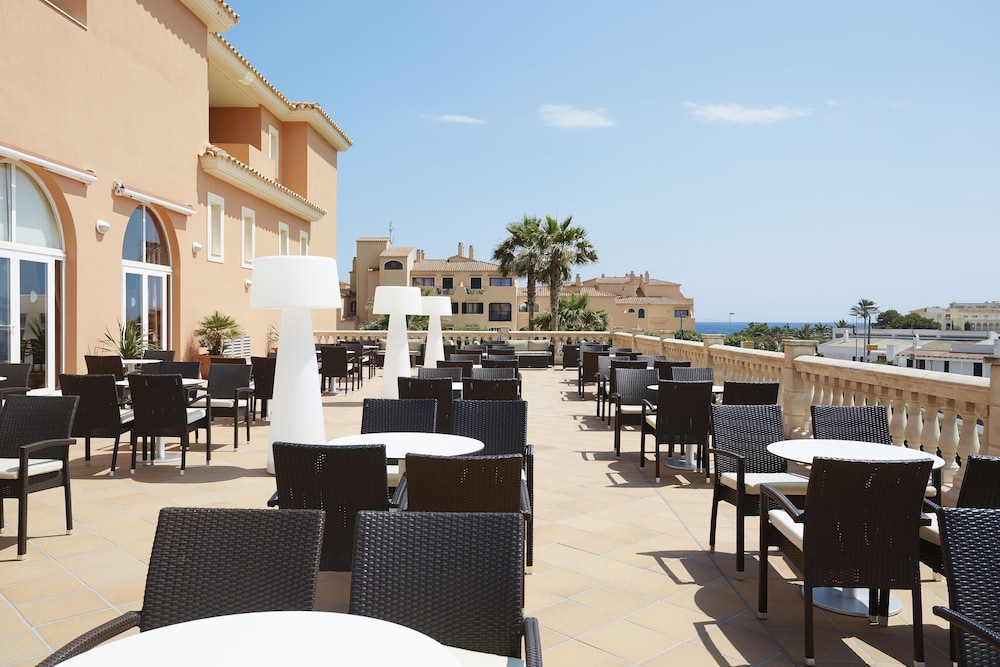 Grupotel Macarella Suites & Spa — Restaurant & bars in Cala'n Bosch, Balearic Islands
