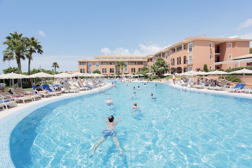 Grupotel Macarella Suites & Spa — Swimming pool in Cala'n Bosch, Balearic Islands