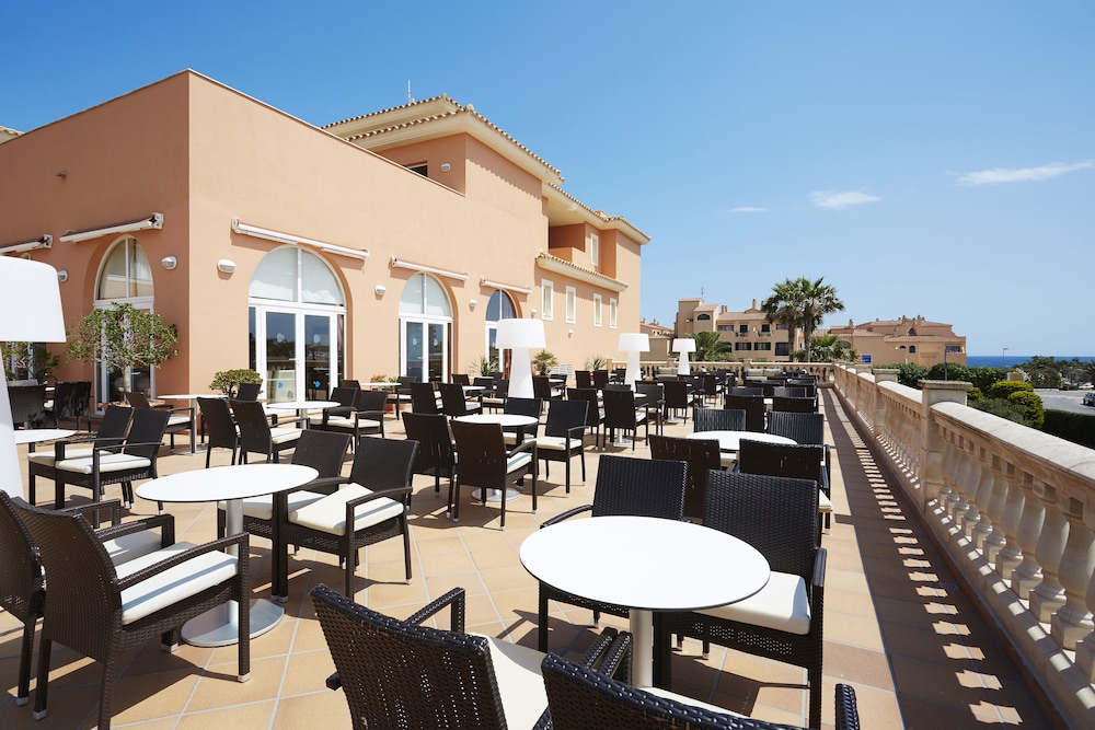 Grupotel Macarella Suites & Spa — Restaurant & bars in Cala'n Bosch, Balearic Islands