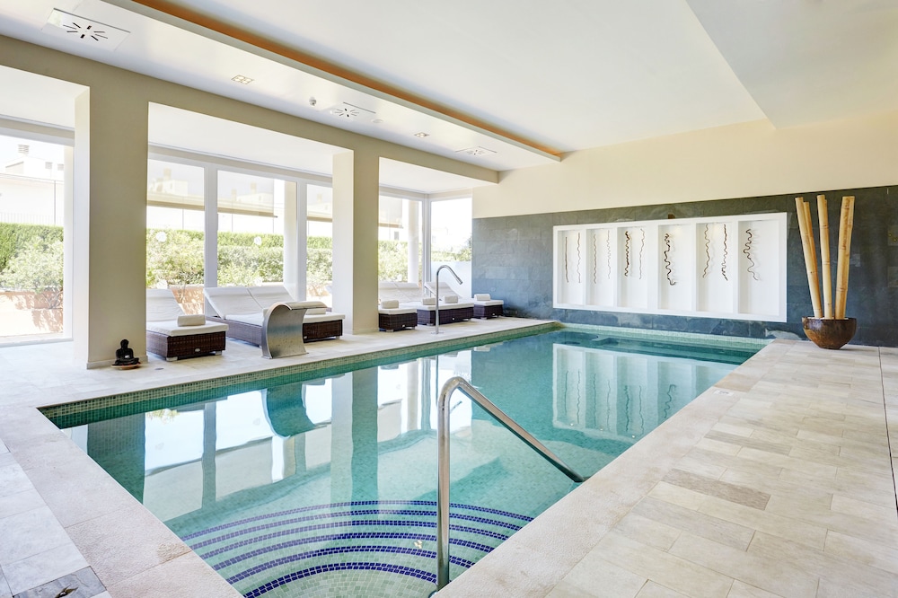 Grupotel Macarella Suites & Spa — Swimming pool in Cala'n Bosch, Balearic Islands