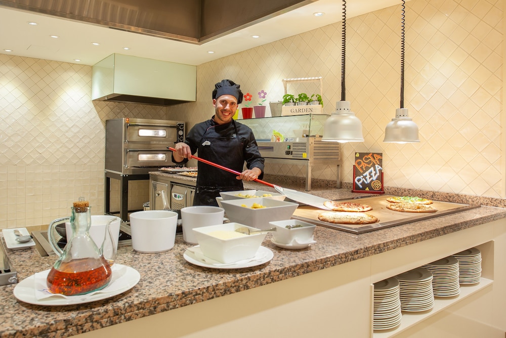 Grupotel Macarella Suites & Spa — Restaurant & bars in Cala'n Bosch, Balearic Islands