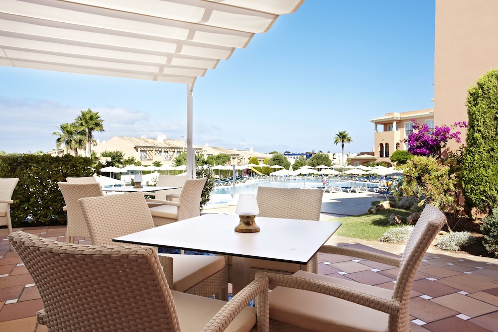Grupotel Macarella Suites & Spa — Restaurant & bars in Cala'n Bosch, Balearic Islands