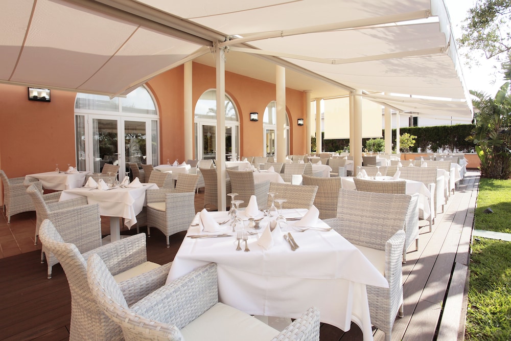 Grupotel Macarella Suites & Spa — Restaurant & bars in Cala'n Bosch, Balearic Islands
