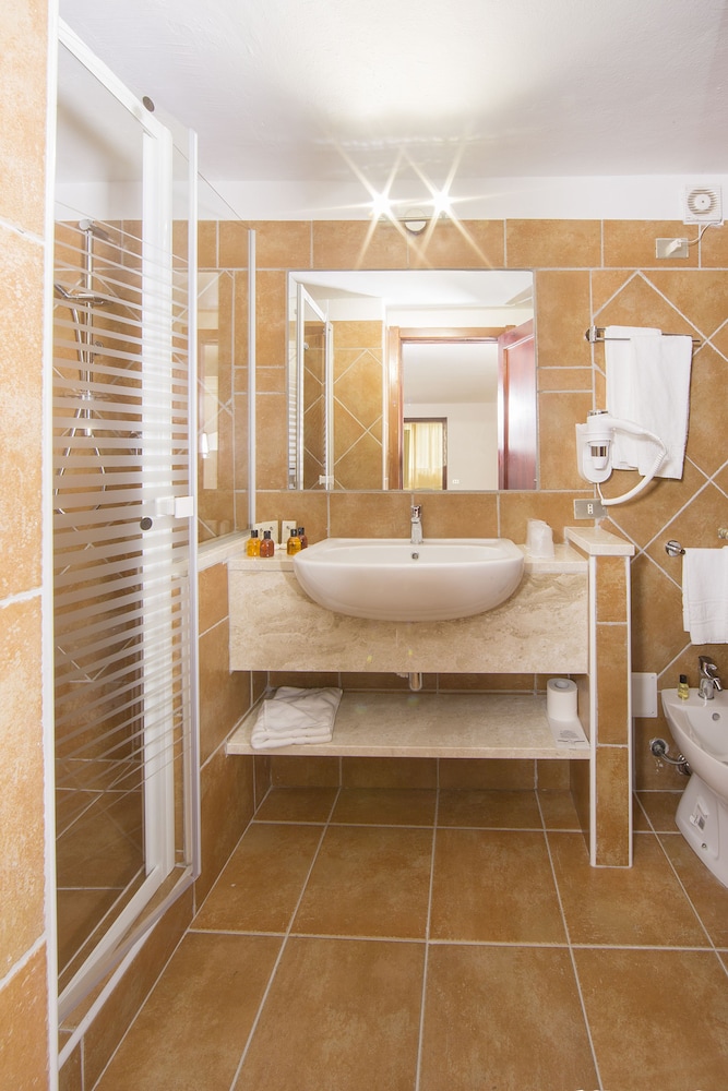 Colonna Beach Hotel Marinella — Hotel rooms in Golfo Aranci, Sardinia
