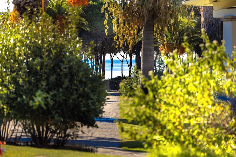 Hotel Costa Dei Fiori — Beach in Santa Margherita di Pula, Sardinia