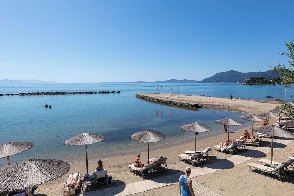Corfu Holiday Palace Hotel — Beach in Corfu Town, Ionian Islands