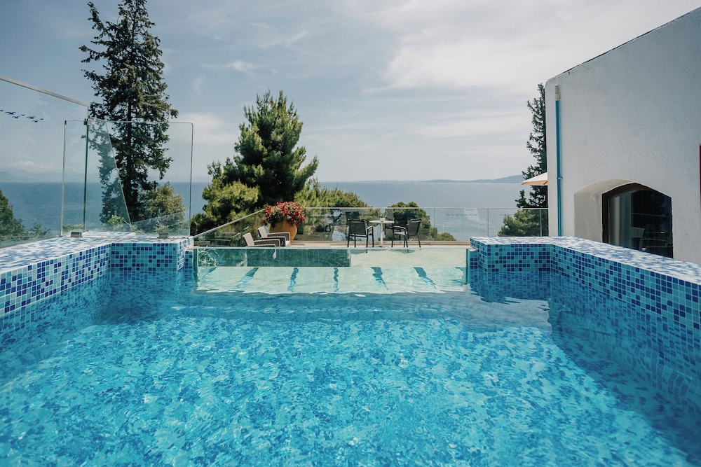 Corfu Holiday Palace Hotel — Swimming pool in Corfu Town, Ionian Islands