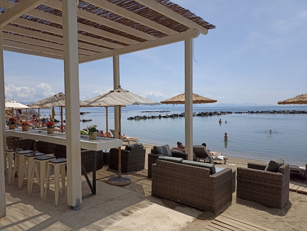 Corfu Holiday Palace Hotel — Beach in Corfu Town, Ionian Islands