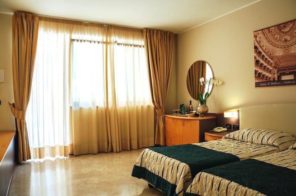 Hotel Ariston & Palazzo Santa Caterina — Hotel rooms in Taormina, Sicily