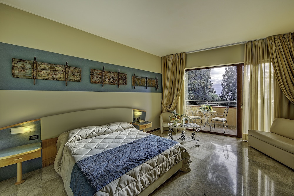 Hotel Ariston & Palazzo Santa Caterina — Hotel rooms in Taormina, Sicily