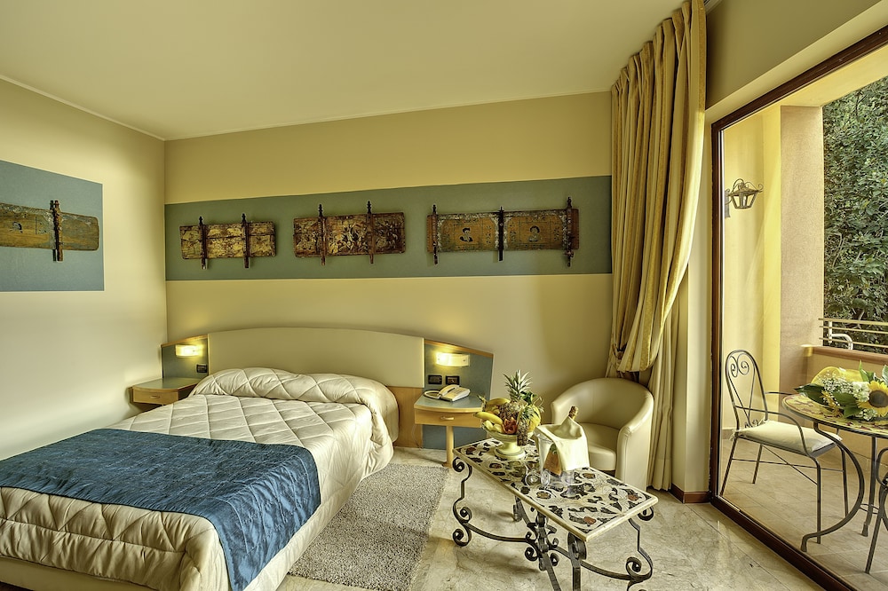 Hotel Ariston & Palazzo Santa Caterina — Hotel rooms in Taormina, Sicily