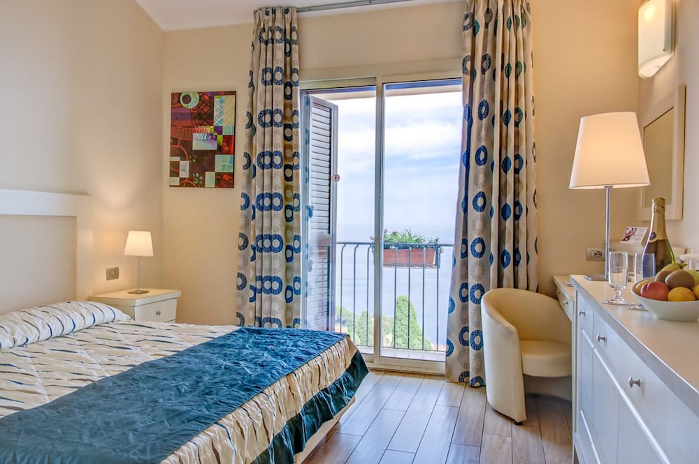 Hotel Ariston & Palazzo Santa Caterina — Hotel rooms in Taormina, Sicily