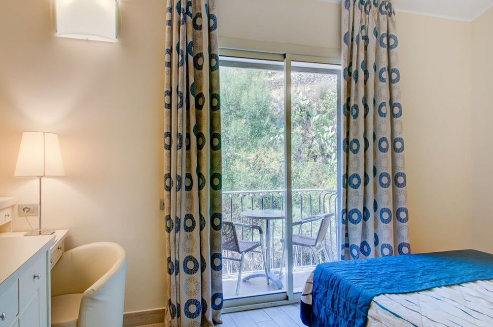 Hotel Ariston & Palazzo Santa Caterina — Hotel rooms in Taormina, Sicily