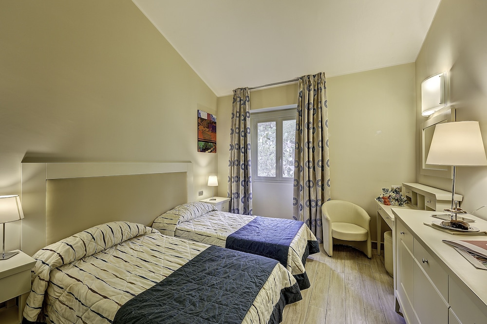 Hotel Ariston & Palazzo Santa Caterina — Hotel rooms in Taormina, Sicily