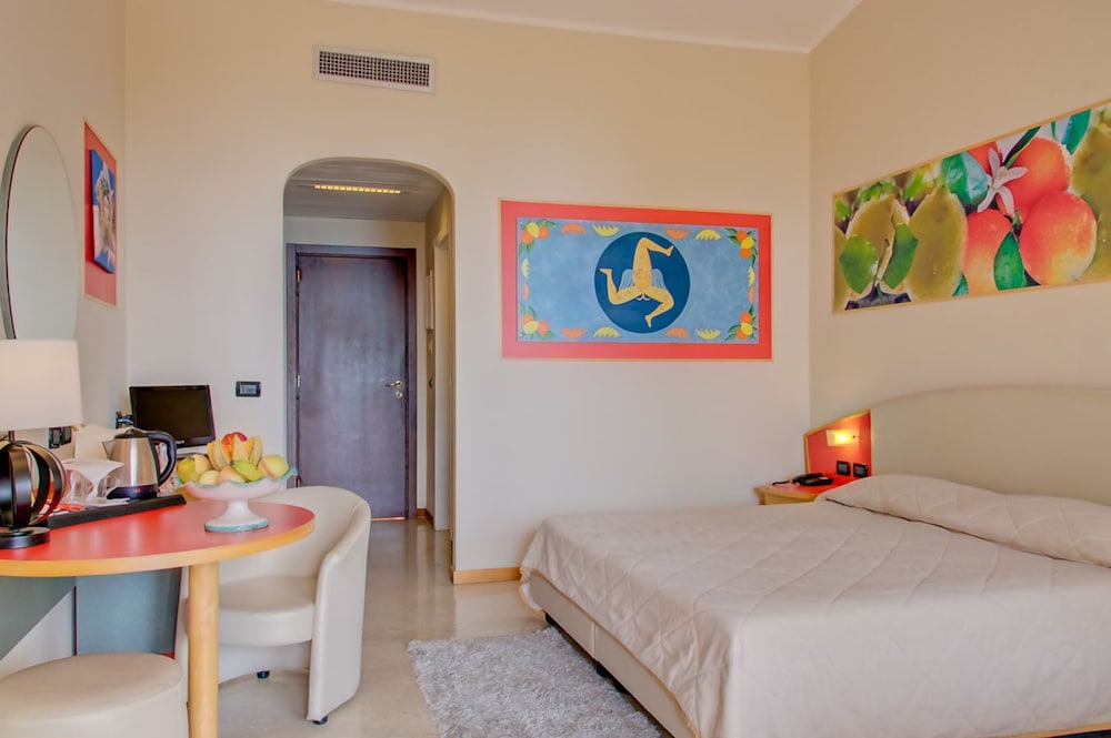 Hotel Ariston & Palazzo Santa Caterina — Hotel rooms in Taormina, Sicily