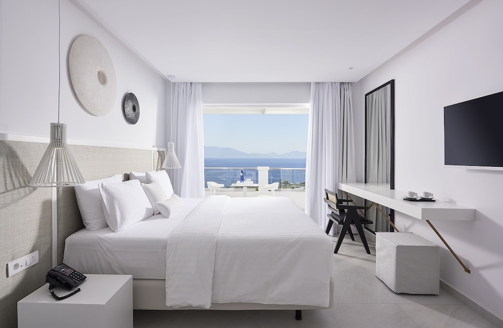 Dimitra Beach Hotel & Suites — Hotel rooms in Psalidi, South Aegean