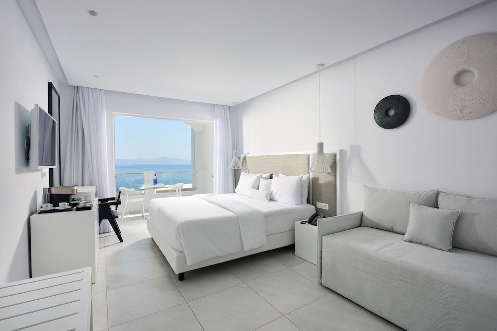 Dimitra Beach Hotel & Suites — Hotel rooms in Psalidi, South Aegean