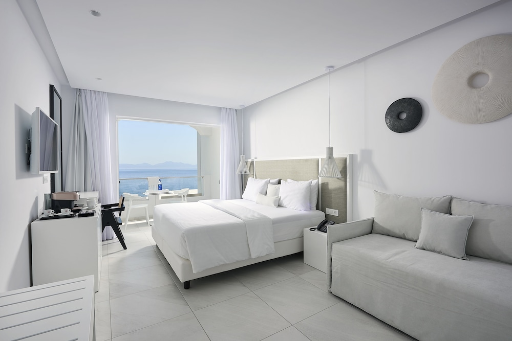 Dimitra Beach Hotel & Suites — Hotel rooms in Psalidi, South Aegean