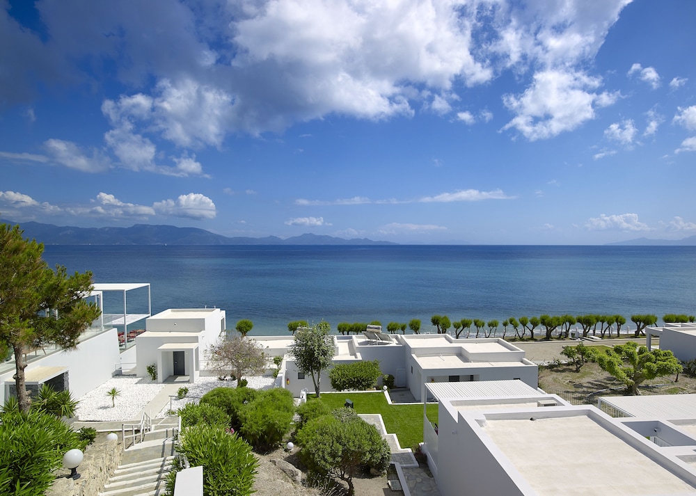 Dimitra Beach Hotel & Suites — Beach in Psalidi, South Aegean