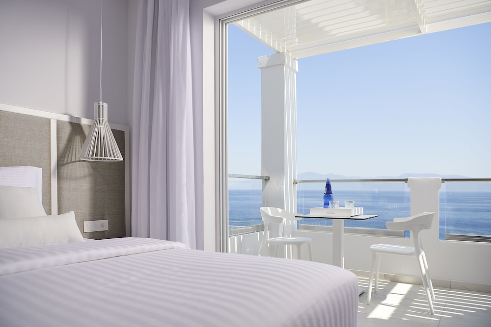 Dimitra Beach Hotel & Suites — Hotel rooms in Psalidi, South Aegean