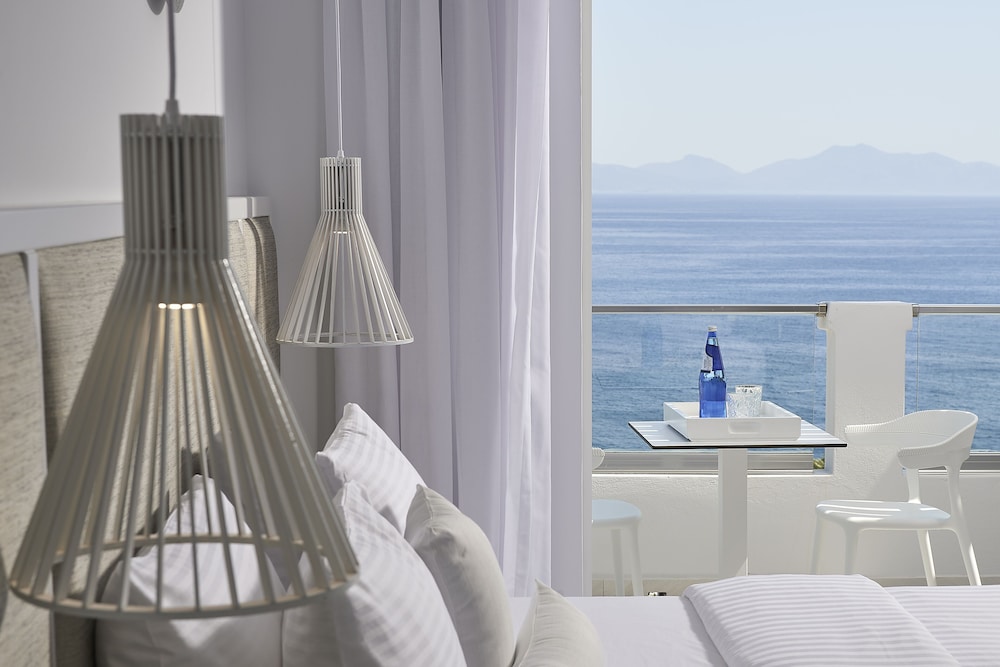 Dimitra Beach Hotel & Suites — Hotel rooms in Psalidi, South Aegean