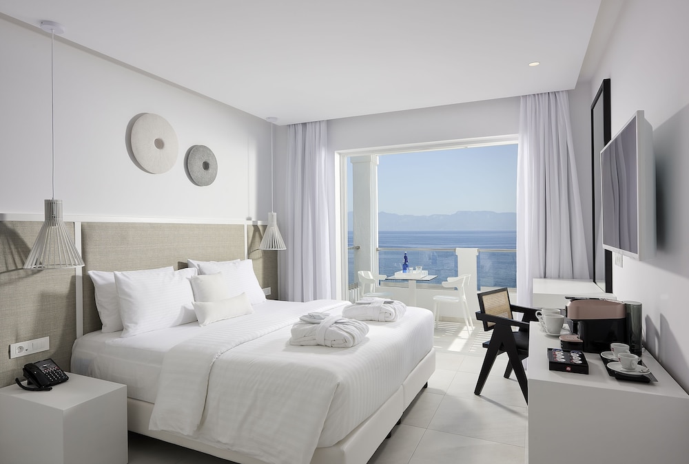 Dimitra Beach Hotel & Suites — Hotel rooms in Psalidi, South Aegean