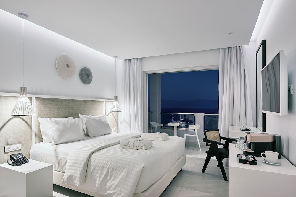 Dimitra Beach Hotel & Suites — Hotel rooms in Psalidi, South Aegean