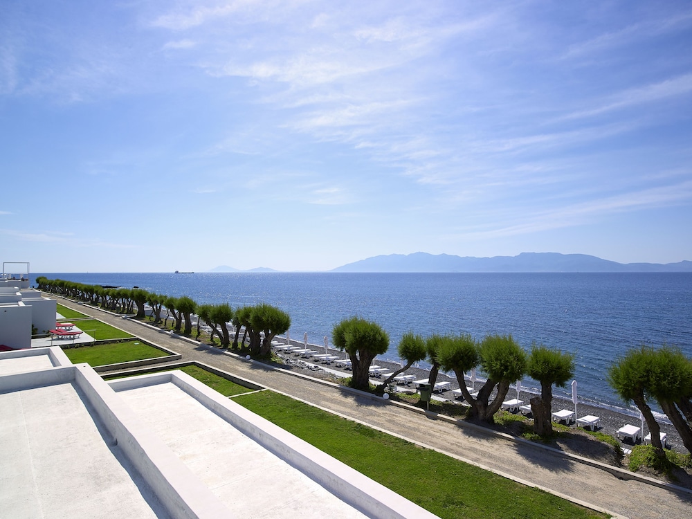 Dimitra Beach Hotel & Suites — Beach in Psalidi, South Aegean