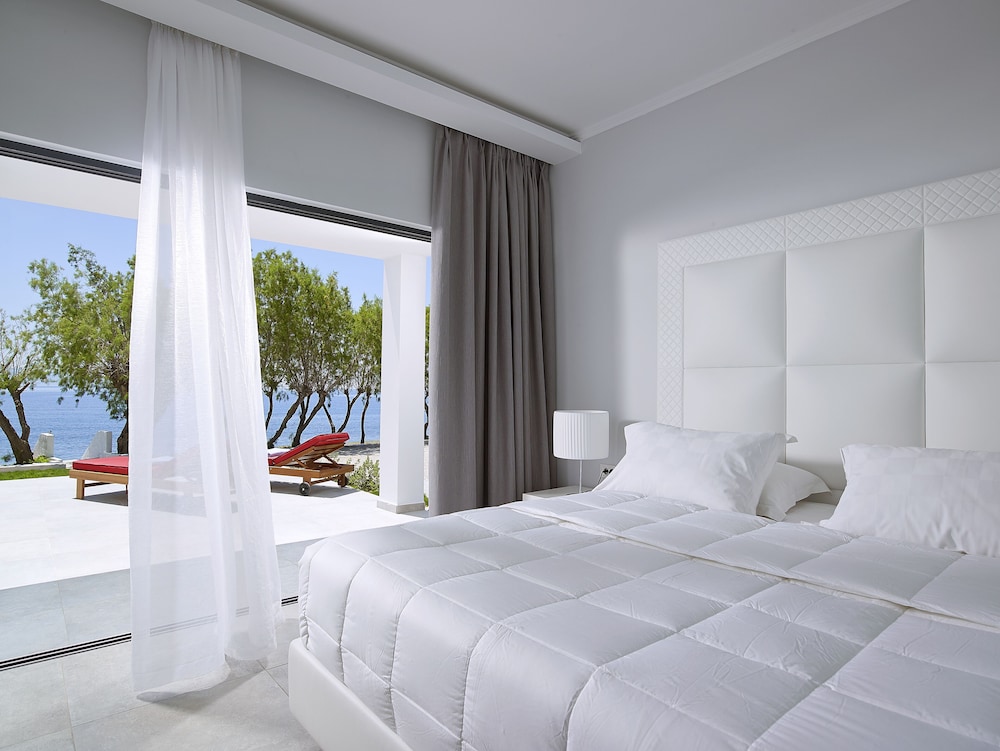 Dimitra Beach Hotel & Suites — Hotel rooms in Psalidi, South Aegean