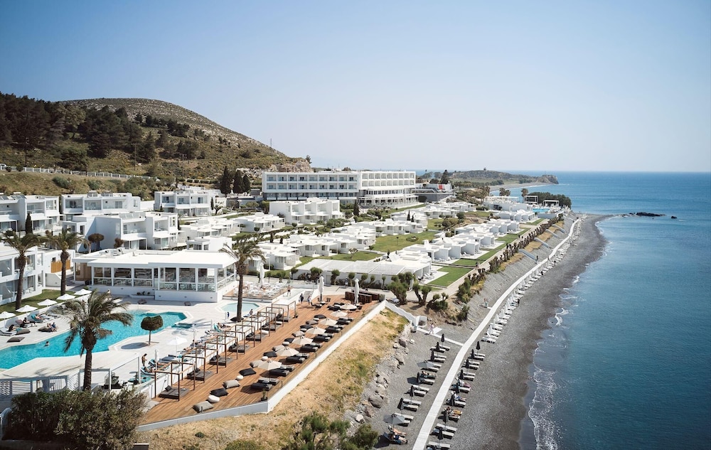 Dimitra Beach Hotel & Suites — Beach in Psalidi, South Aegean