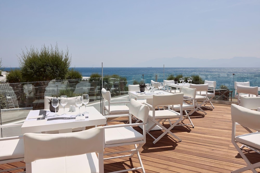 Dimitra Beach Hotel & Suites — Restaurant & bars in Psalidi, South Aegean