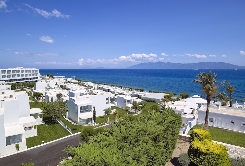 Dimitra Beach Hotel & Suites — Beach in Psalidi, South Aegean