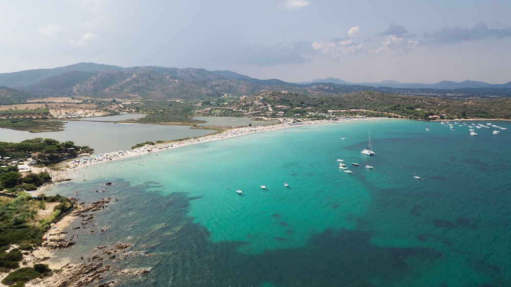 Residence Hotel Lu Nibareddu — Beach in Loiri Porto San Paolo, Sardinia