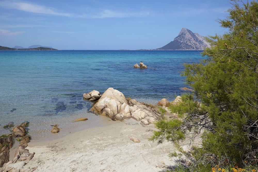 Residence Hotel Lu Nibareddu — Beach in Loiri Porto San Paolo, Sardinia