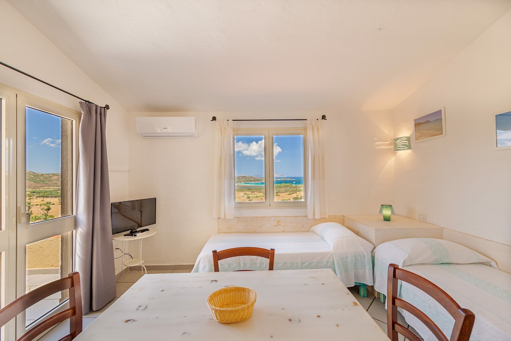 Residence Hotel Lu Nibareddu — Hotel rooms in Loiri Porto San Paolo, Sardinia