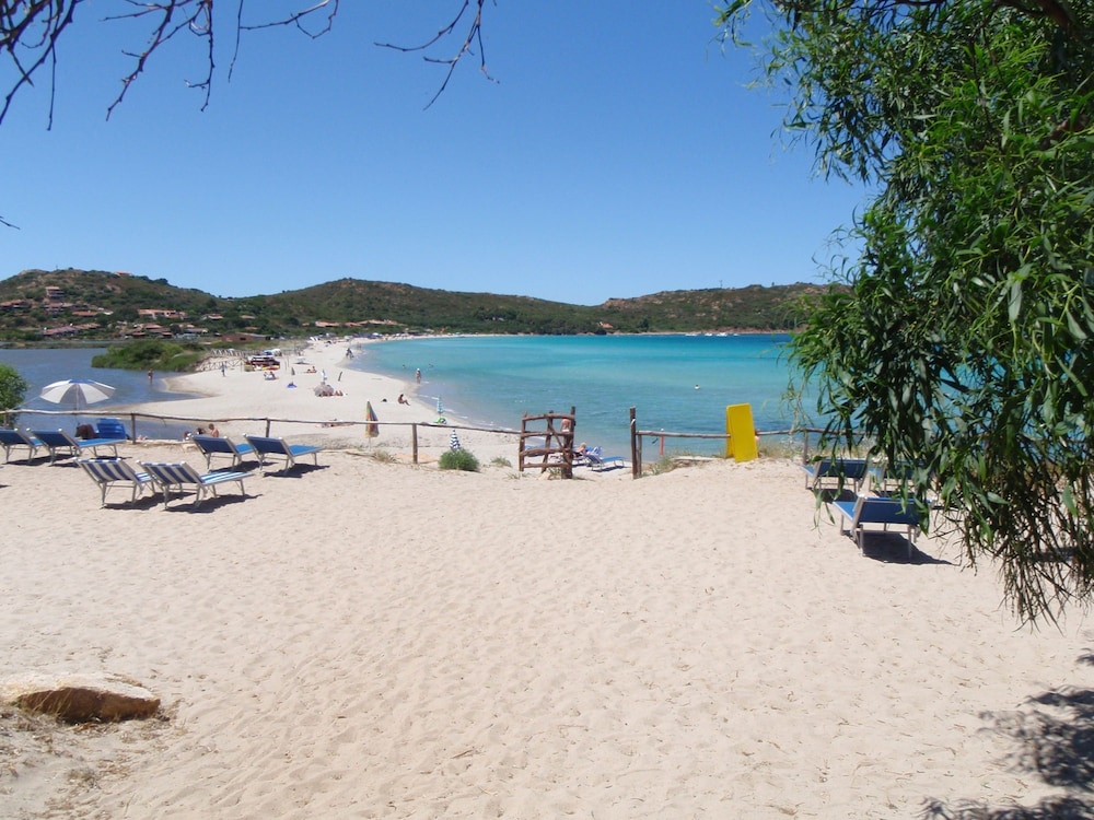Residence Hotel Lu Nibareddu — Beach in Loiri Porto San Paolo, Sardinia