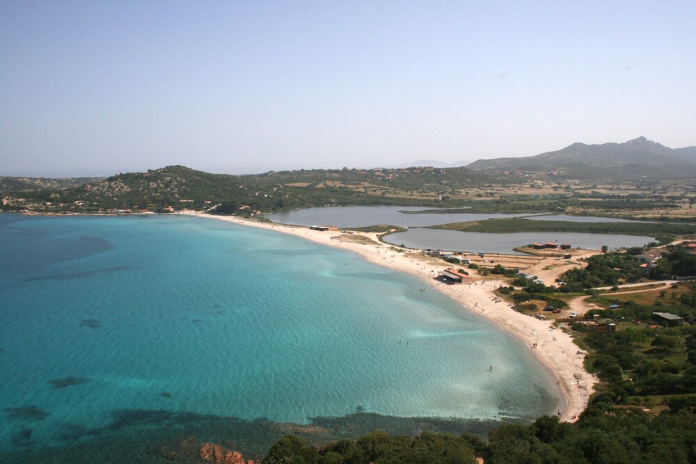 Residence Hotel Lu Nibareddu — Beach in Loiri Porto San Paolo, Sardinia