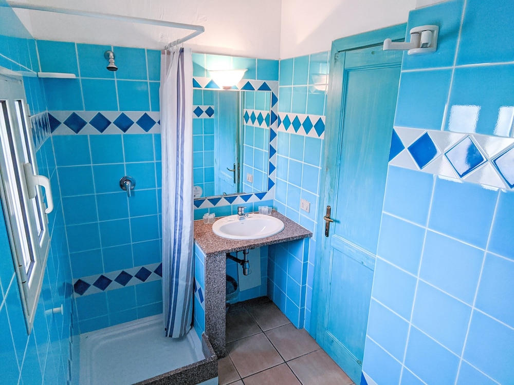 Residence Hotel Lu Nibareddu — Hotel rooms in Loiri Porto San Paolo, Sardinia