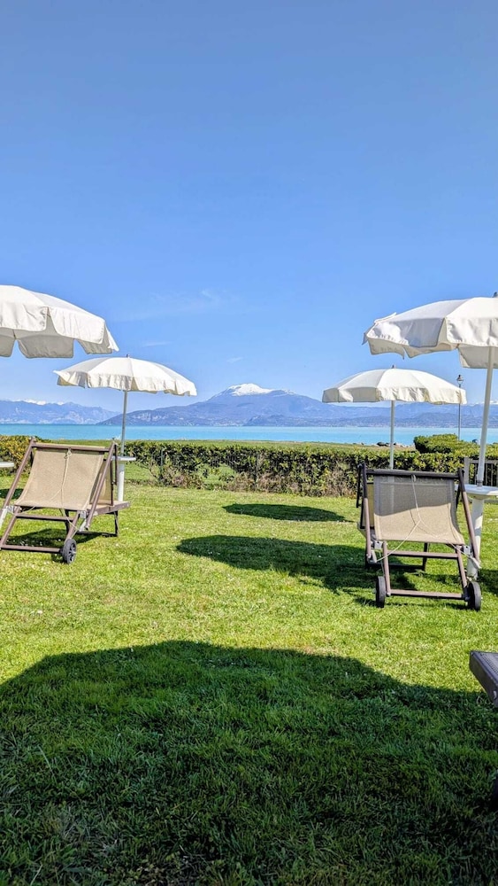 Yachting Hotel Mistral — Beach in Sirmione, Lombardy