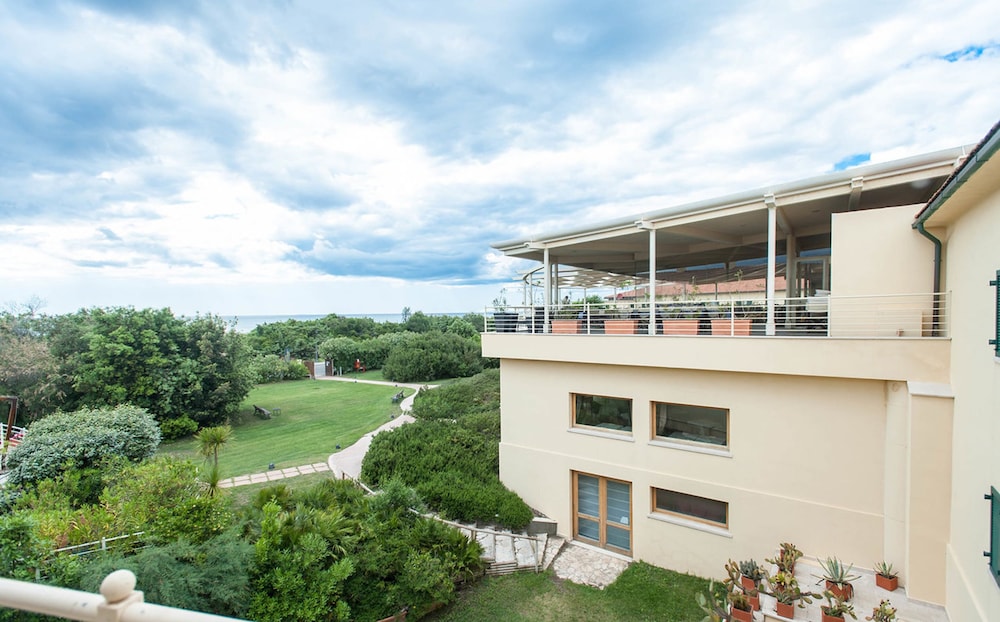 Tombolo Talasso & Beach Resort — Hotel building in Castagneto Carducci, Tuscany