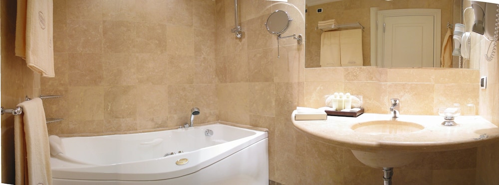 Tombolo Talasso & Beach Resort — Hotel rooms in Castagneto Carducci, Tuscany