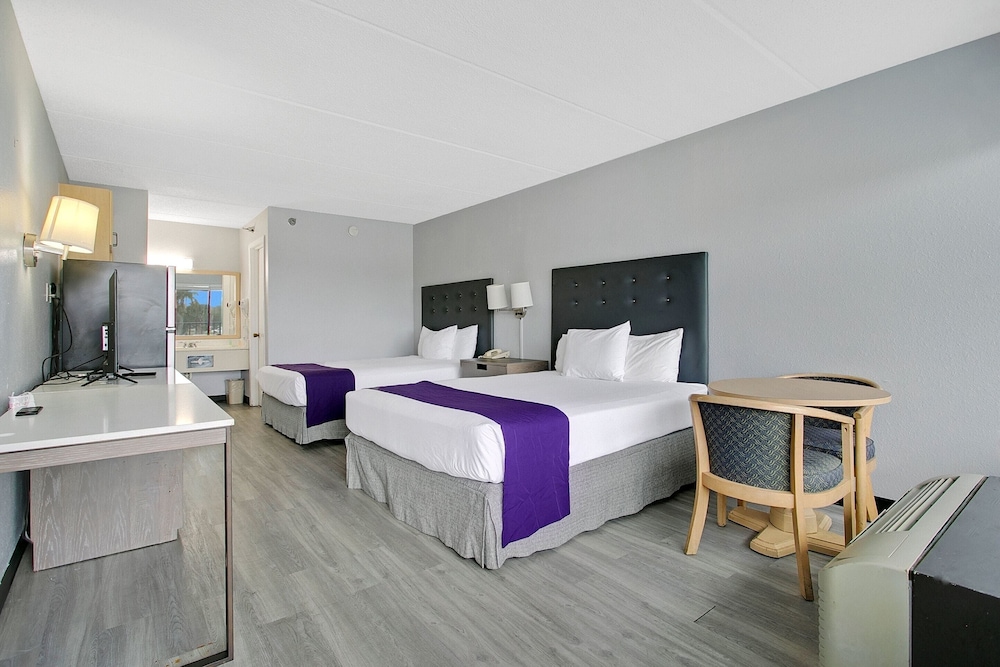 Home 1 Suites Extended Stay - Kissimmee — Hotel rooms in Kissimmee, Florida
