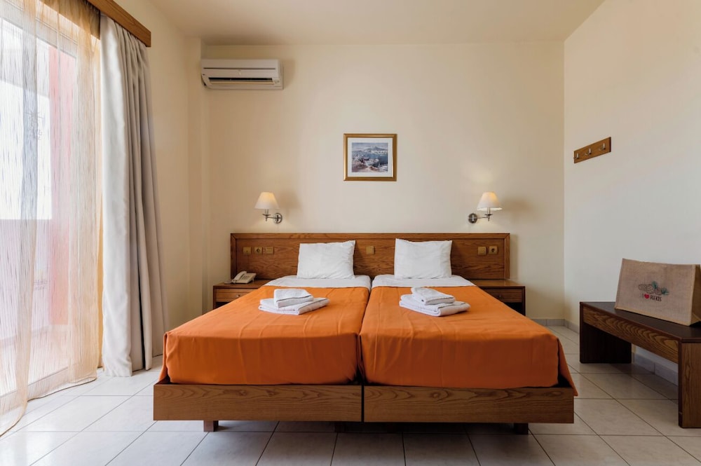 Stella Hotel — Hotel rooms in Pefkos, South Aegean