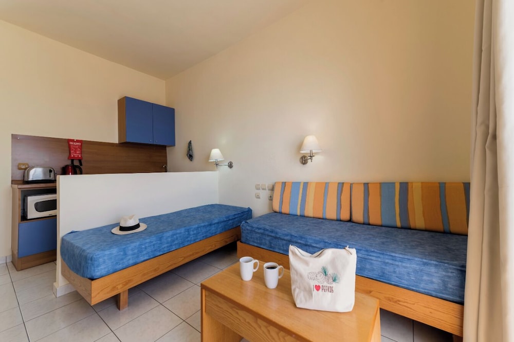 Stella Hotel — Hotel rooms in Pefkos, South Aegean
